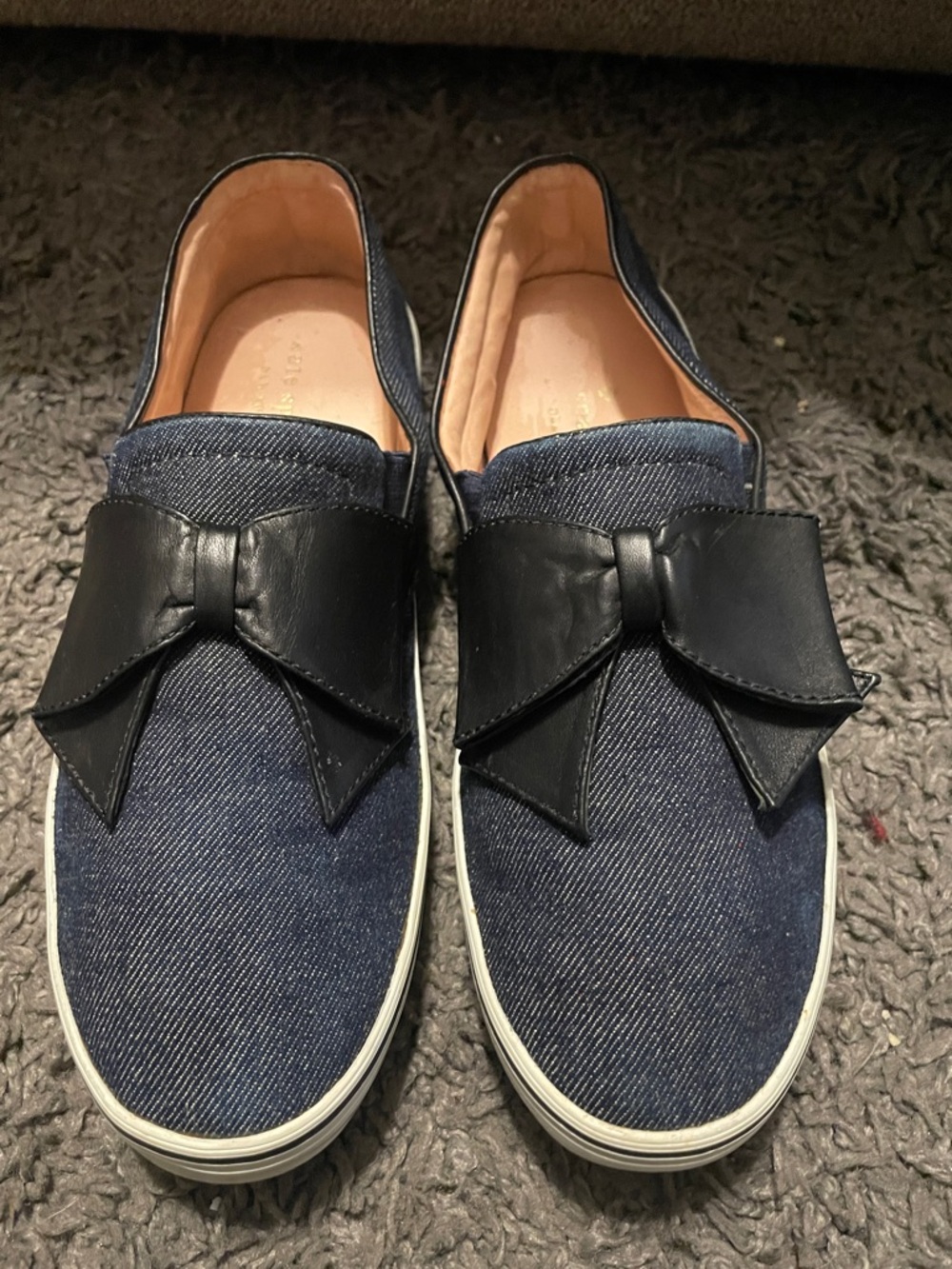Kate Spade Casual Navy Denim Slip-On Sneakers with Black leather Bow Accent